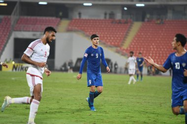 Bangkok-Tayland-19 Ocak 2020: Jasurbek yakhshiboev # 9 Özbekistan Oyuncusu AFC U23 şampiyonluğu 2020 ile Tayland rajmankala Stadyumu 'nda Özbekistan' a karşı oynanan maç sırasında