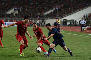 Hanoi-Vietnam-19 Nov 2019: Unidentified fan of Vietnam playing wave human during fifa world cup qatar 2022 against Vietnam at My dinh stadium,Vietnam