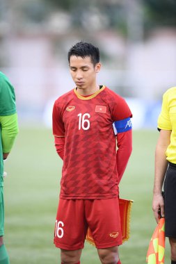 Laguna-Filipin-5 Aralık 2019: Hung Dung Do # 16 Vietnamlı oyuncu SEAGAMES 2019 sırasında Tayland ile Vietnam arasındaki Binan futbol stadyumu, Filipinler