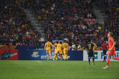 Bangkok-Tayland-11 Ocak 2020: AFC U23 Şampiyonası 2020 'de Tayland ile Avustralya arasındaki Rajamankala Stadyumu' nda oynanan karşılaşmada gol atan Tayland 'lı futbolcu.