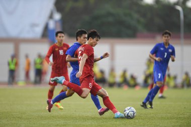 Laguna-Philippine-5 Aralık 2019: Van Hau DOAN # 5 Vietnamlı oyuncu SEAGAMES 2019 sırasında Vietnam 'a karşı binan futbol stadyumu, Filipinler