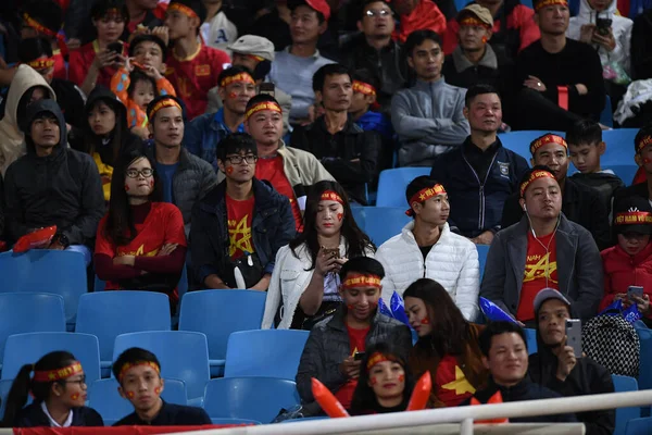Hanoi-Vietnam-19 Nov 2019: Unidentified fan of Vietnam playing wave human during fifa world cup qatar 2022 against Vietnam at My dinh stadium,Vietnam