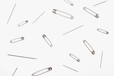 pins with needles on a white background 