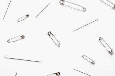 pins with needles on a white background 