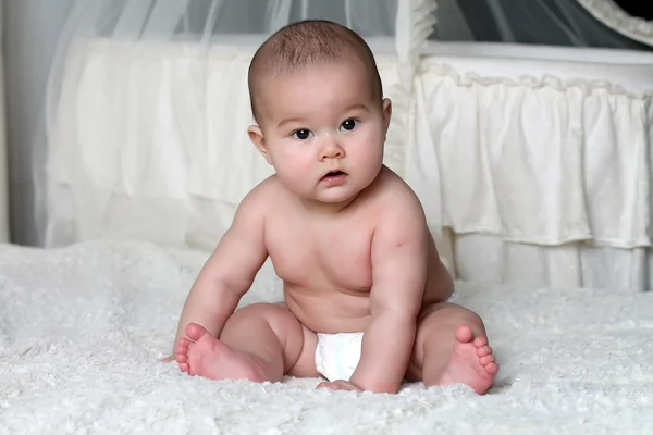 Sitting baby Stock Picture