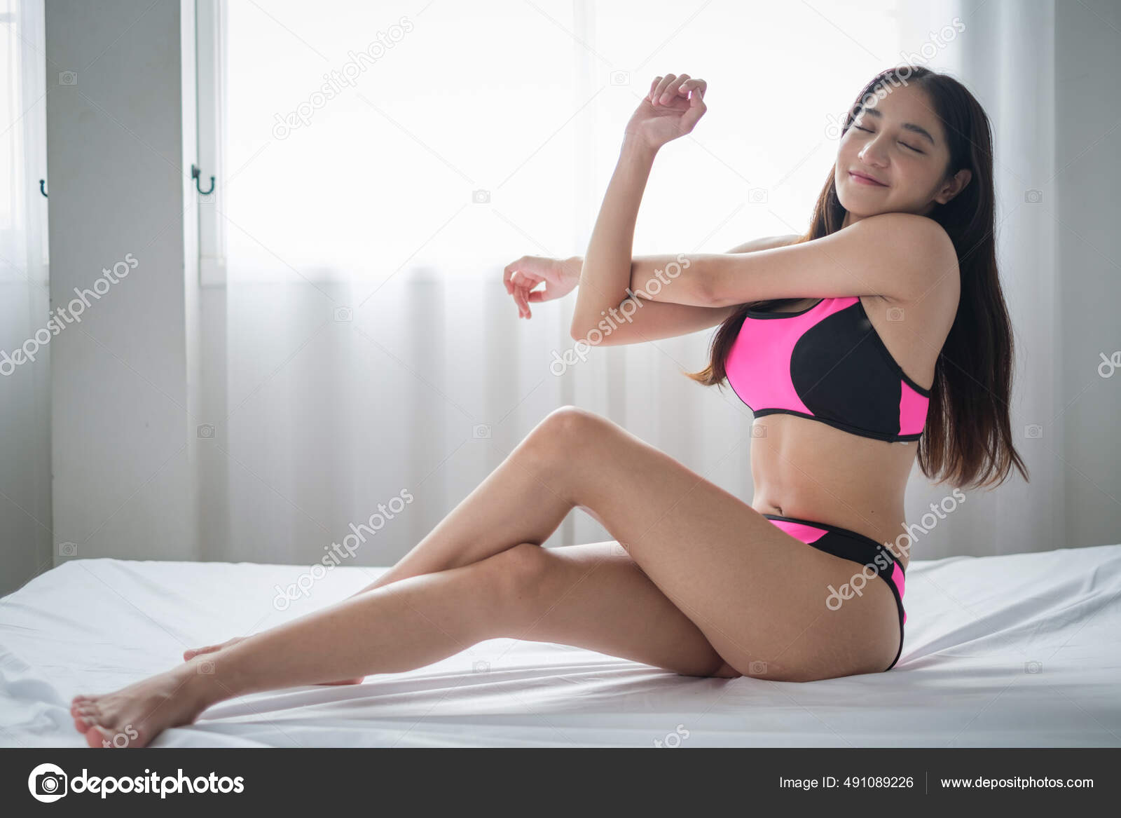 Asian Woman Bikini Exercise Yoga Home Environment Stock Photo by ©Success Media 491089226 picture