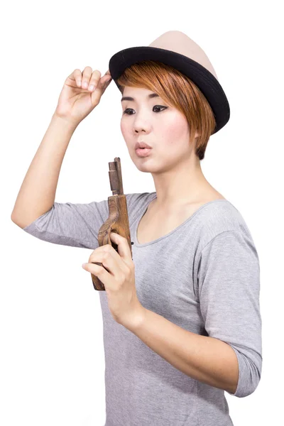 Oyuncak tabanca ile kadın — Stok fotoğraf