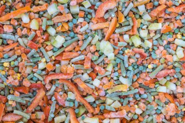 Sağlıklı bir diyet için dondurulmuş sebze karışımı. Ham doğal ürünlerin geçmişi. Sağlıklı ve sağlıklı gıda konsepti.