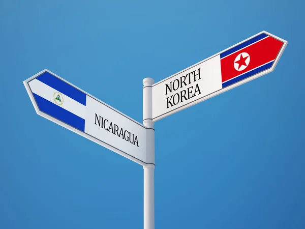 Северная Корея подписала Концепцию флагов Никарагуа — стоковое фото