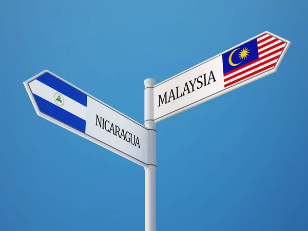 Nicaragua Malaysia  Sign Flags Concept — Stock Photo, Image