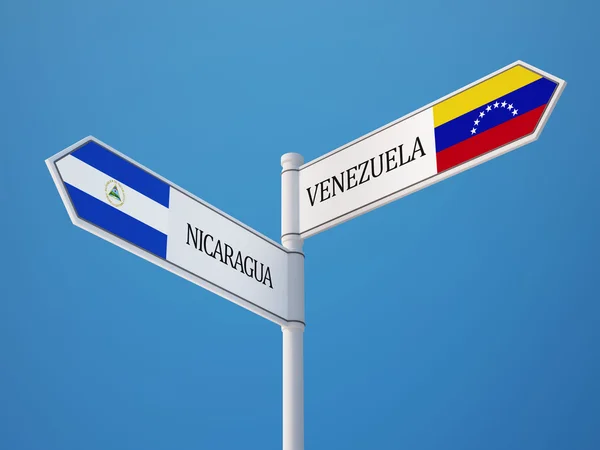 Venezuela nicaragua sign flags konzept — Stockfoto