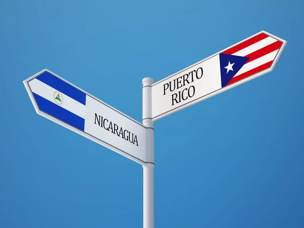 Puerto Rico Nikaragui znak flagi koncepcja — Zdjęcie stockowe