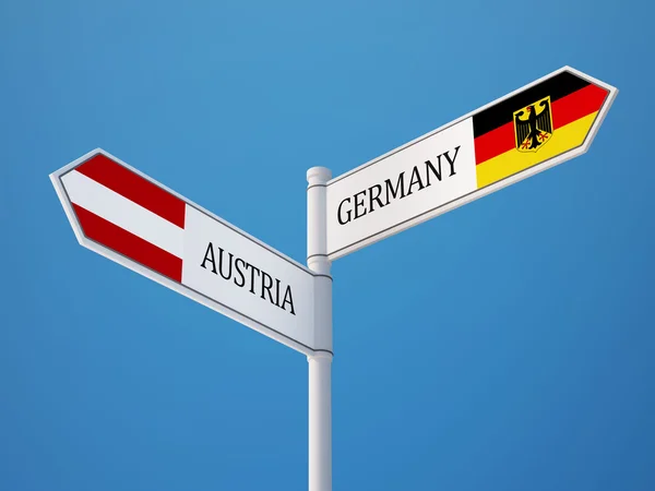 Österrike Tyskland tecken flaggor koncept — Stockfoto