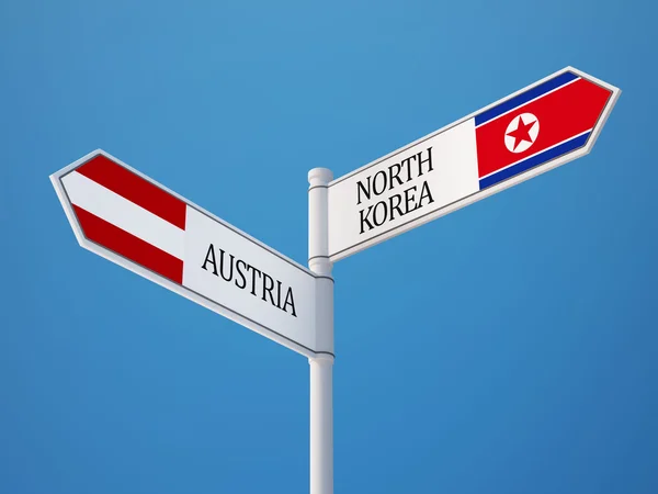 Áustria Coreia do Norte Signo Bandeiras Conceito — Fotografia de Stock