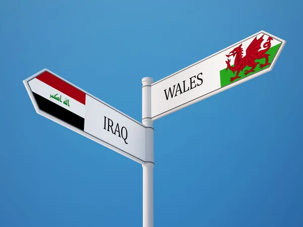 Wales Irak tecken flaggor koncept — Stockfoto