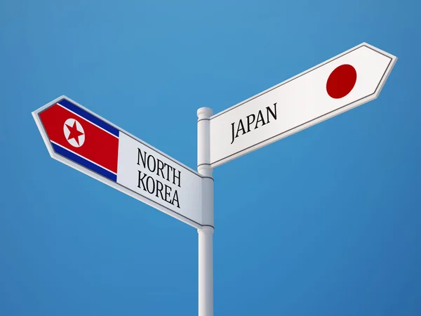 Japan Nordkorea tecken flaggor koncept — Stockfoto