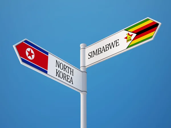 Zimbabwe North Korea  Sign Flags Concept — Stock Photo, Image