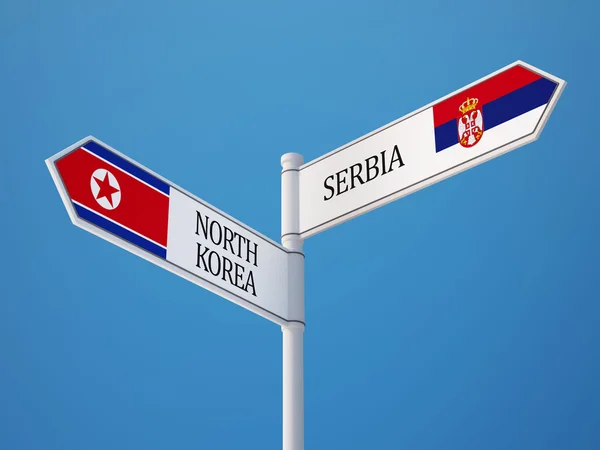 Serbien Nordkorea tecken flaggor koncept — Stockfoto