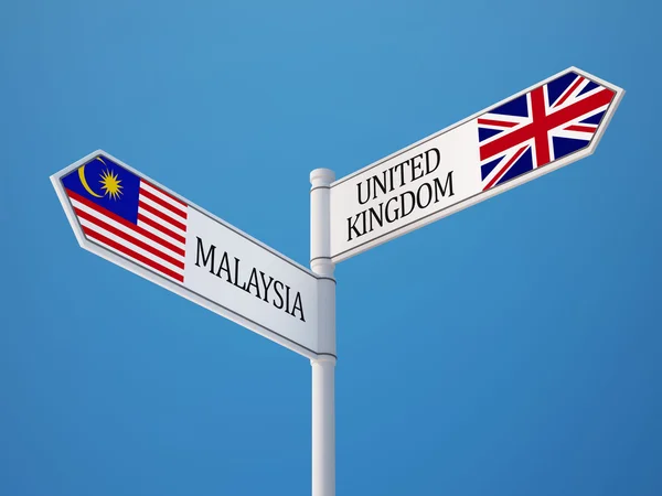 Förenade kungariket Malaysia tecken flaggor koncept — Stockfoto