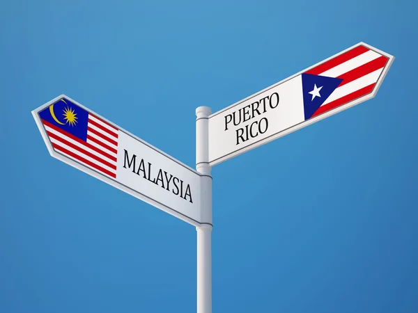 Пуэрто-Рико вывешивает флаги Малайзии — стоковое фото