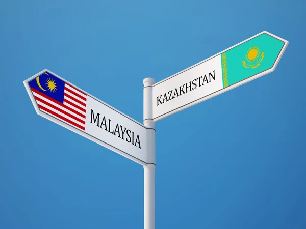 Kazakstan Malaysia tecken flaggor koncept — Stockfoto