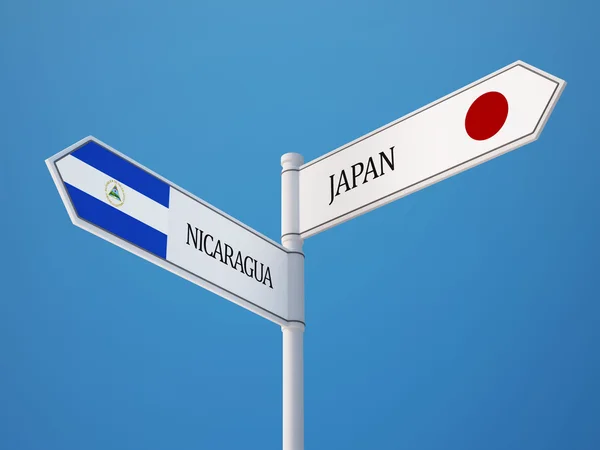 Nicaragua Japón Firma el concepto de banderas — Foto de Stock