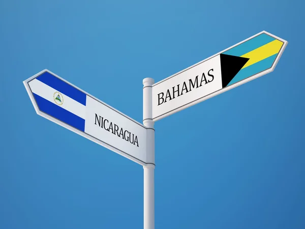 Bahamas Nicaragua segno bandiere concetto — Foto Stock