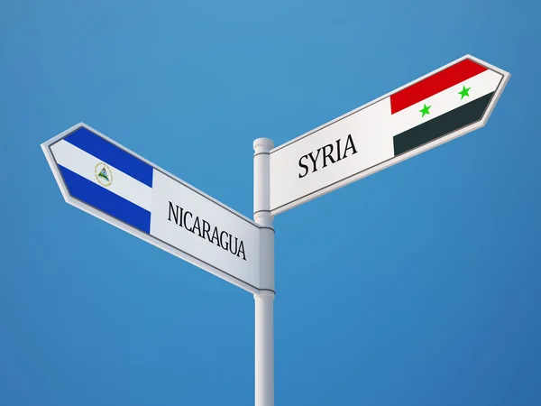 Syrien Nicaragua tecken flaggor koncept — Stockfoto