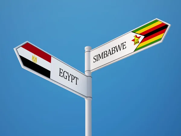 Zimbabué Egito assinar Bandeiras Conceito — Fotografia de Stock