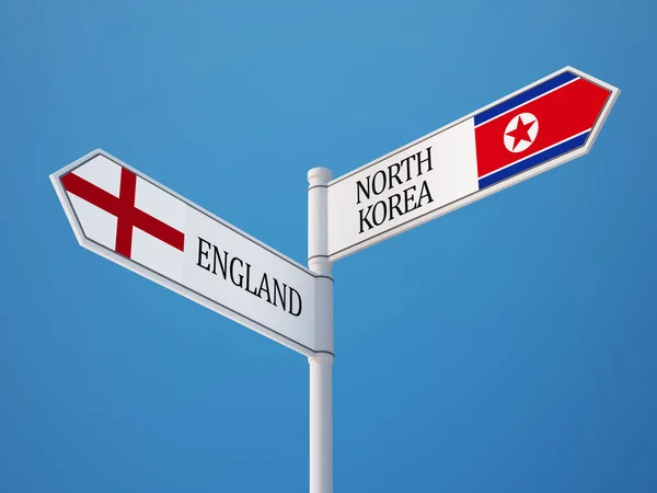 England Nordkorea tecken flaggor koncept — Stockfoto