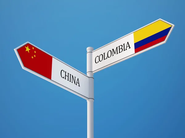 Colombia Kina tecken flaggor koncept — Stockfoto