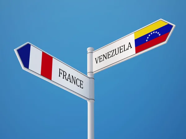 Venezuela Frankrike tecken flaggor koncept — Stockfoto