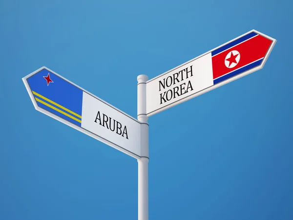 Severní Korea Aruba znamení příznaky koncept — Stock fotografie