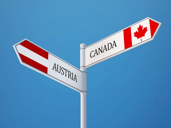 Österrike Kanada tecken flaggor koncept — Stockfoto