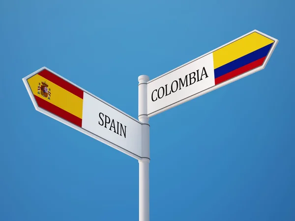 Spanien Colombia tecken flaggor koncept — Stockfoto