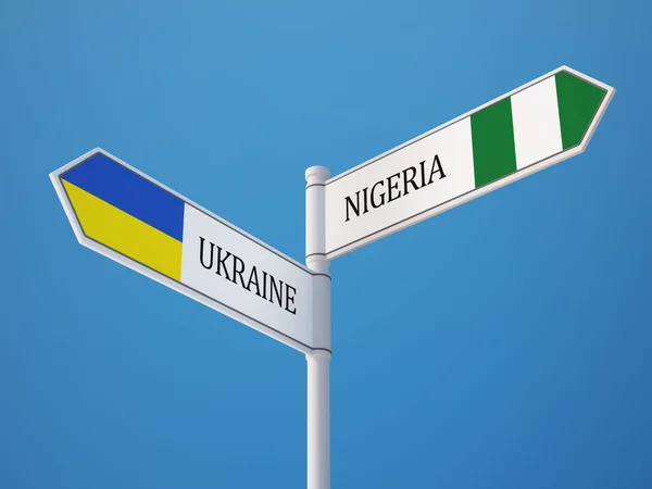Ukraina Nigeria tecken flaggor koncept — Stockfoto