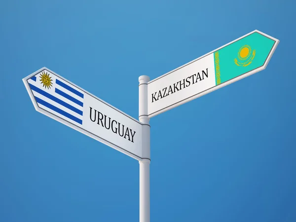 Kasachstan uruguay sign flags concept — Stockfoto