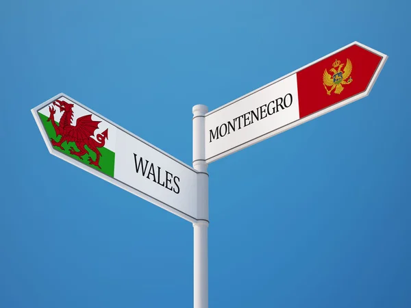 Wales Montenegro tecken flaggor koncept — Stockfoto