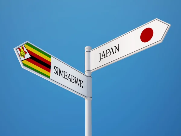 Zimbabwe Japan teken vlaggen Concept — Stockfoto