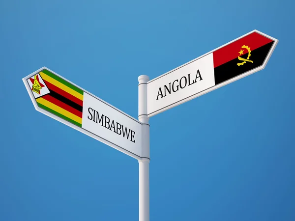 Zimbabwe Angola tecken flaggor koncept — Stockfoto