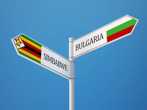 Zimbabwe Bulgarien underteckna flaggor koncept — Stockfoto