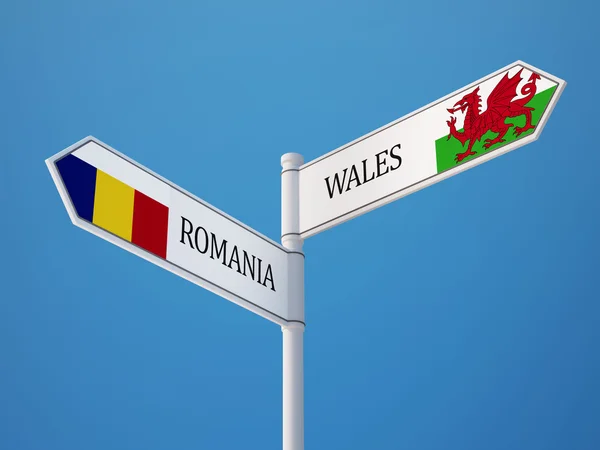 Rumänien Wales tecken flaggor koncept — Stockfoto