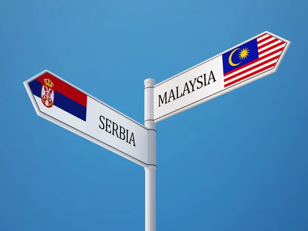 Serbien och Malaysia tecken flaggor koncept — Stockfoto