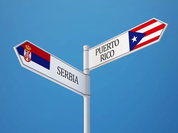 Serbien och Puerto Rico tecken flaggor koncept — Stockfoto