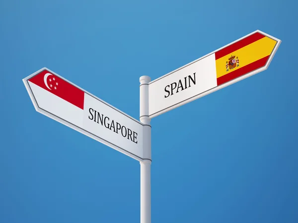 Singapore Spanien tecken flaggor koncept — Stockfoto