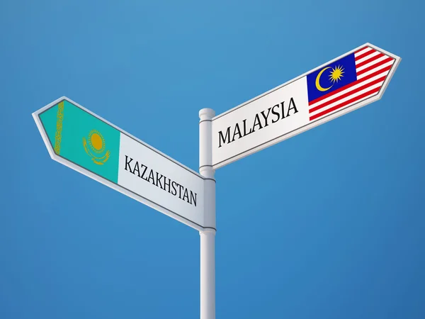 Kazakstan Malaysia tecken flaggor koncept — Stockfoto