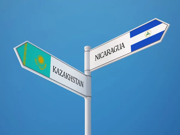 Kazakstan Nicaragua tecken flaggor koncept — Stockfoto