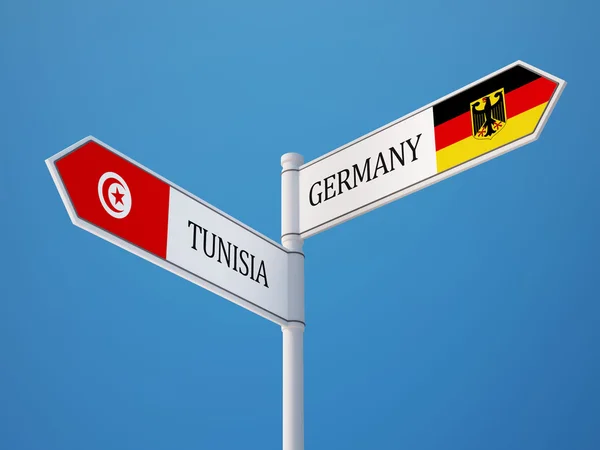 Tunisien Tyskland tecken flaggor koncept — Stockfoto