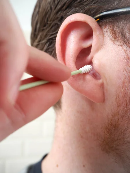 Man Cleaning His Ear Reusable Silicone Tip Zero Waste Lifestyle Stock Photo