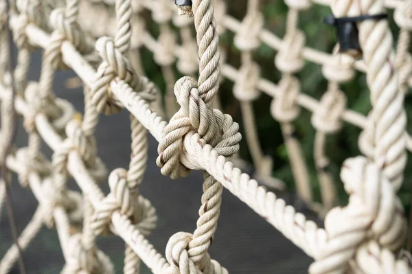 Braided rope into a bridge with rope nets